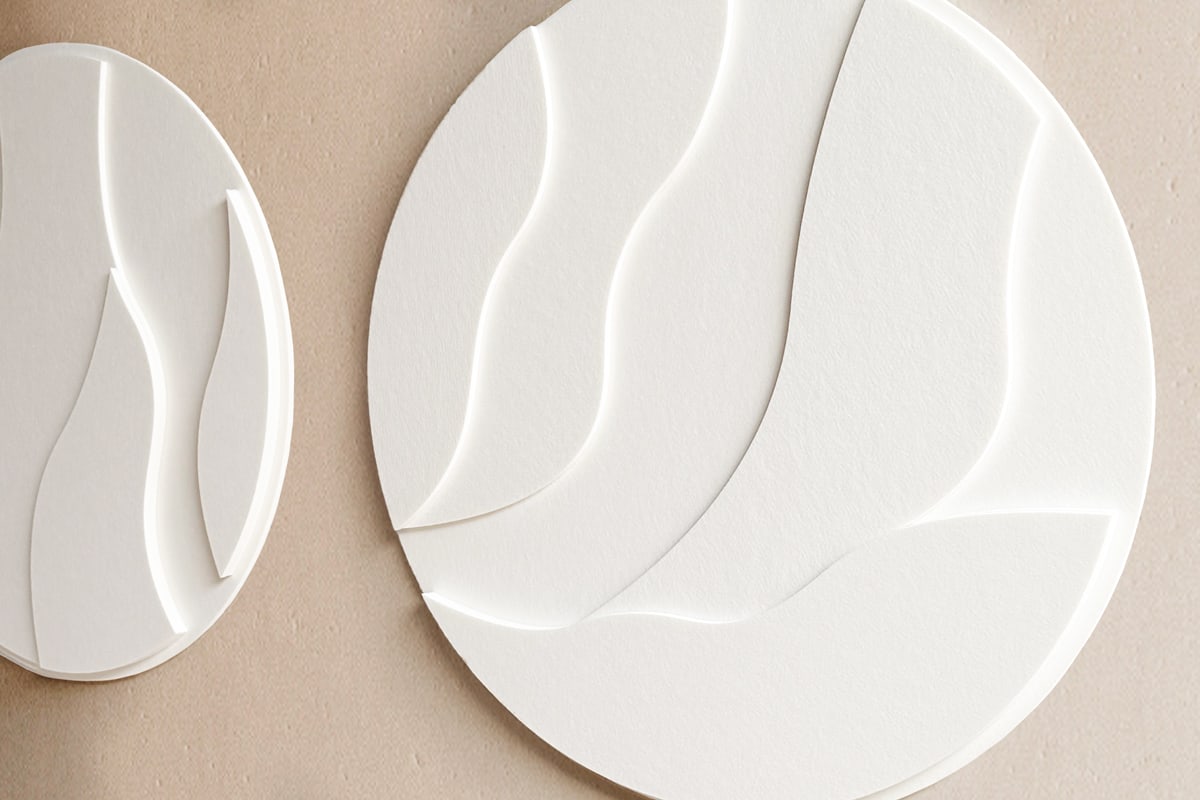 Two Felt Art Round pieces side by side, viewed from an angle